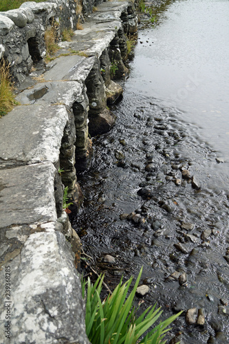 Clapper Bridge over Carrownisky River, Ireland County Mayo Killeen Bunlahinch photo