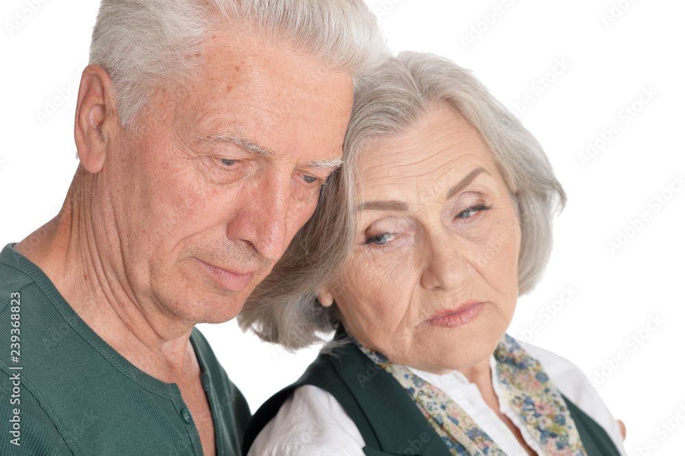 Close up portrait of senior couple isolated on white background Close up portrait of senior couple isolated on white background