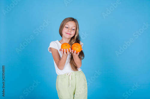 beautiful girl holding two Orange fresh fruit health © dmitriisimakov