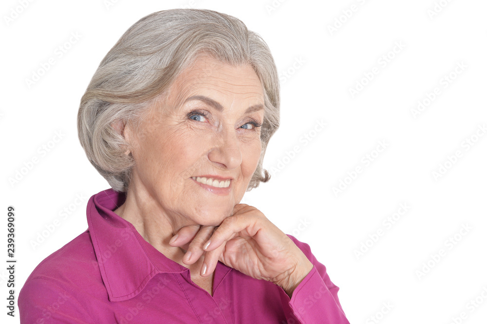 Surprised senior woman posing against white background Surprised senior woman posing against white background