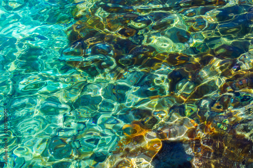background blurred turquoise, clear clear water in the Gulf of Fig Tree, in Protaras, Cyprus, in spring, in April