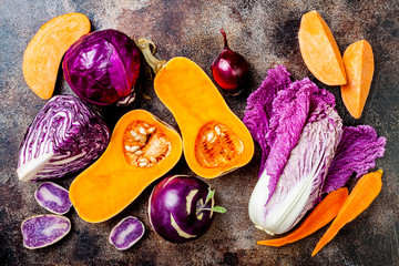 Seasonal winter autumn fall vegetables on rustic background. Plant based vegan or vegetarian cooking concept. Clean eating food, alkaline diet