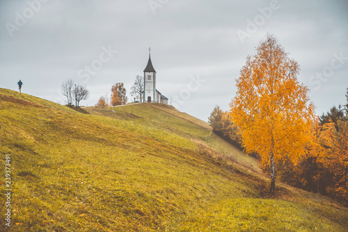 Jamnik, Slovenia, Churich and autumn landscape