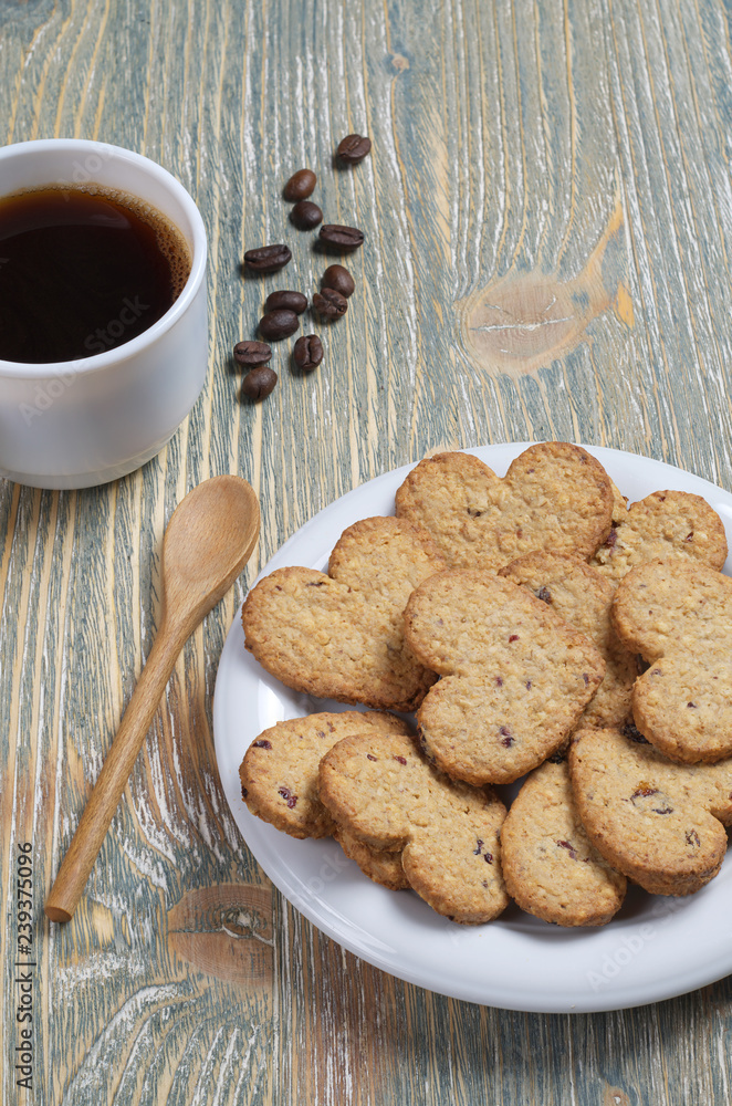 Cookies in the shape of a heart and coffee Cookies in the shape of a heart and coffee