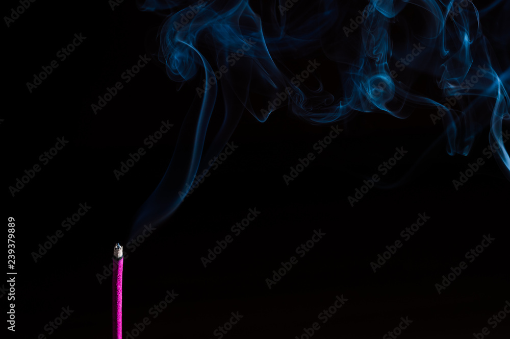 Incense stick on a black background Incense stick on a black background