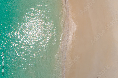 Aerial top view beautiful sea landscape, beach and wave with turquoise sea water with copy space