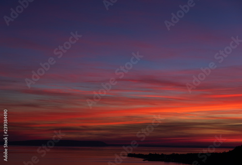 Beautiful and colorful sunset on river Volga