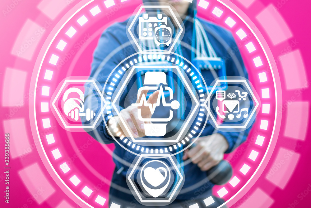 Fototapeta premium Sportsman selects a smart watch heart pulse icon on a virtual screen. Mind wrist fit bracelet band. Sporting innovative digital assistant monitoring health technology.