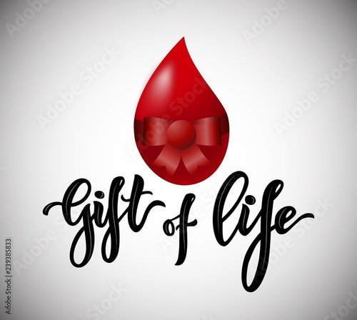 Lettering Gift of life typographic composition with realistic heart.