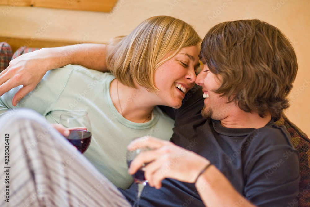 Couple relaxing on sofa Couple relaxing on sofa