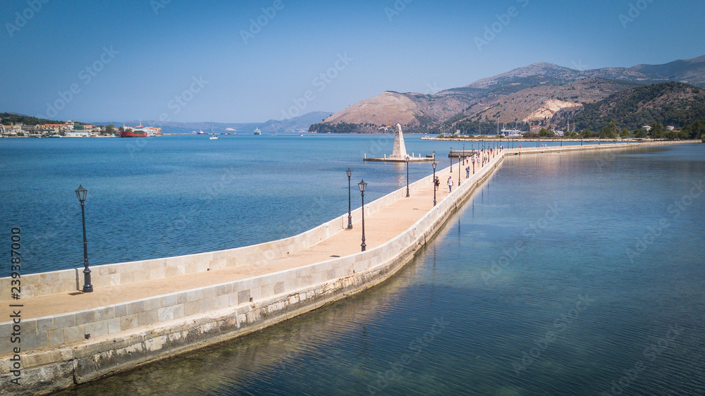 The obelisk and the de Bosset bridge on lakeside in Argostoli, Kefalonia, Greece
