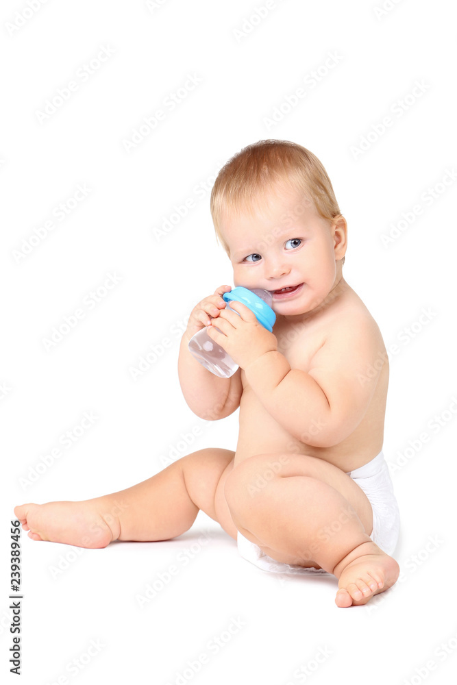 Baby boy drinking water from bottle isolated on white background Baby boy drinking water from bottle isolated on white background