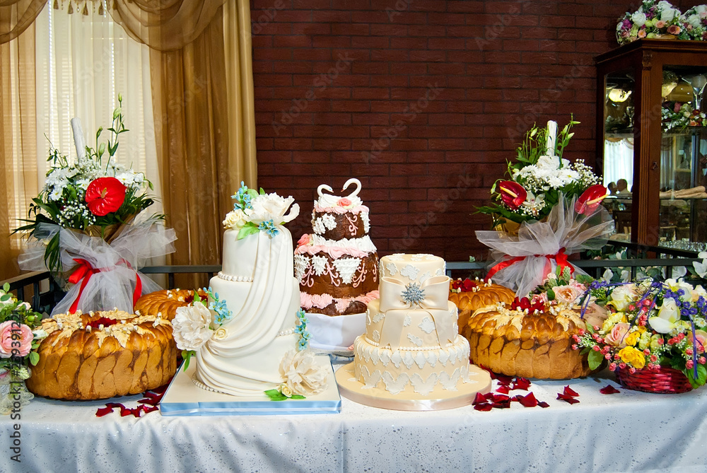 Sweet cake on a festive buffet. Cake on the table in the restaurant. Sweet cake on a festive buffet. Cake on the table in the restaurant.