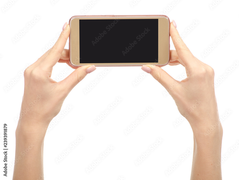 Mobile phone smartphone in hand on a white background. Isolation Mobile phone smartphone in hand on a white background. Isolation
