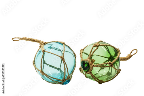 Transparent scandinavian decor glass sphere in ropes isolated on white background