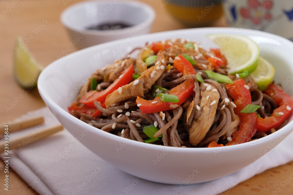 Dark pasta with steamed vegetables and grilled chicken. Delicious buckwheat noodles with vegetables and chicken Dark pasta with steamed vegetables and grilled chicken. Delicious buckwheat noodles with vegetables and chicken