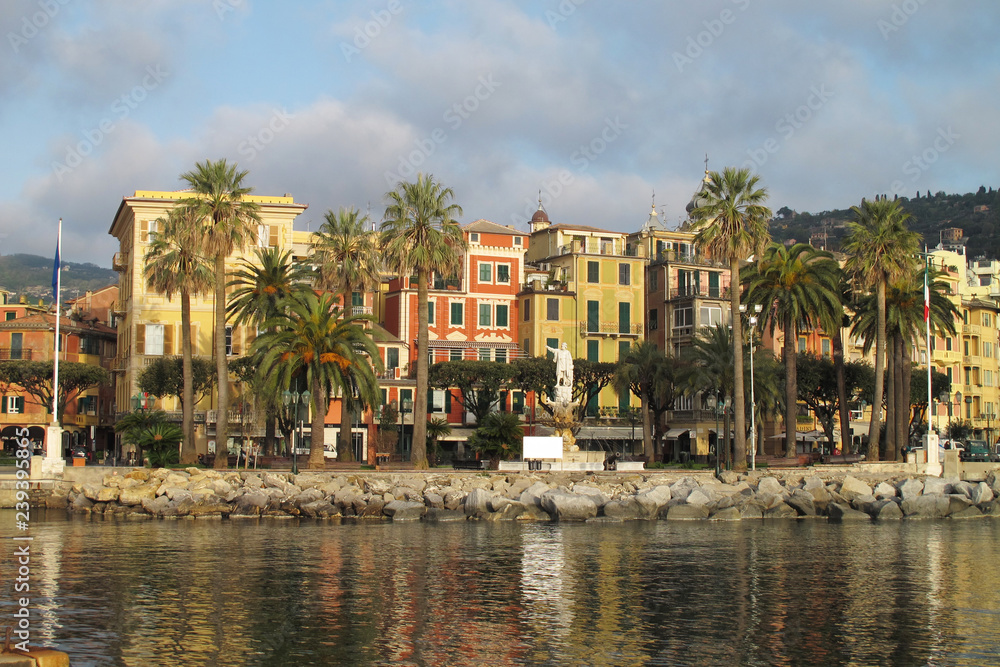 Santa Margherita Ligure, Italy 04-12-2011 Waterfront buildings of Santa Margherita reflected in the calm waters of the harbor on the Italian Riviera.