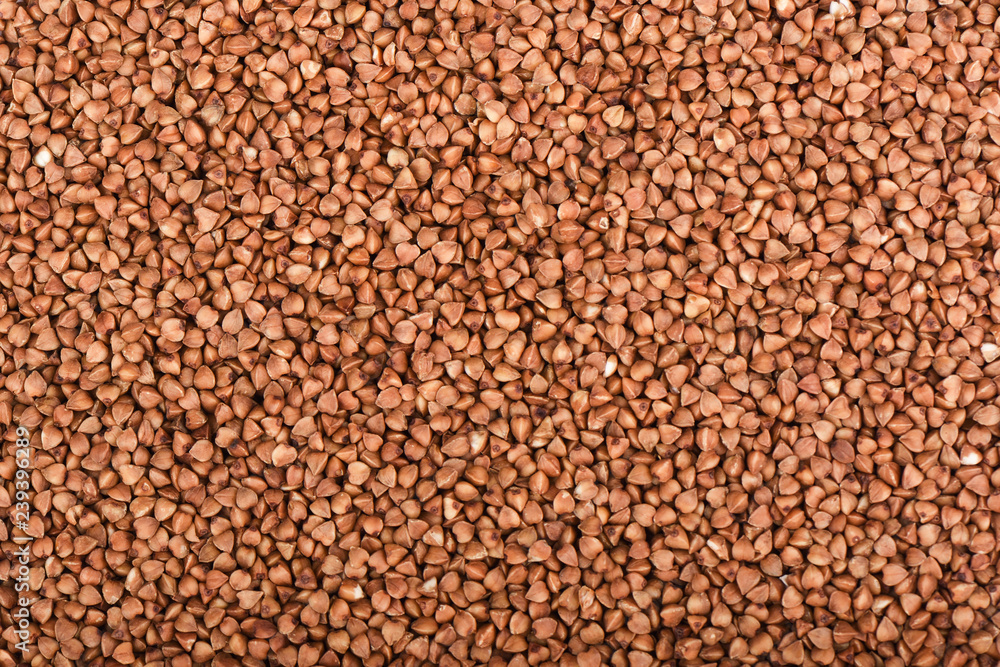 Buckwheat as a background. Traditional cereal for porridge Buckwheat as a background. Traditional cereal for porridge