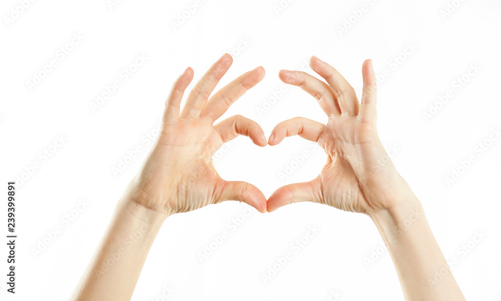 Close-up female tender hands on a white isolated background. Conventional labeling. Close-up female tender hands on a white isolated background. Conventional labeling.