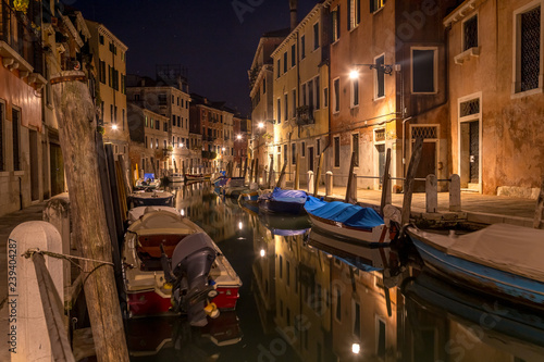 Typical night canal street in Venice, Venezia, Italy
