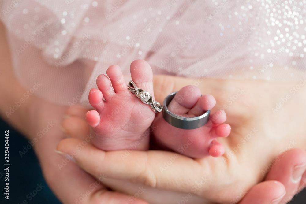 Baby Hand and Wedding Rings Stock Photo - Image of close, innocent: 78914506