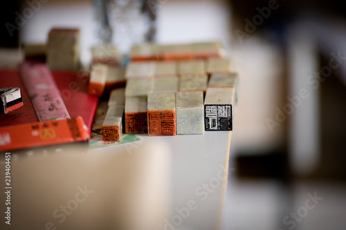 Stamps resting a table. photo