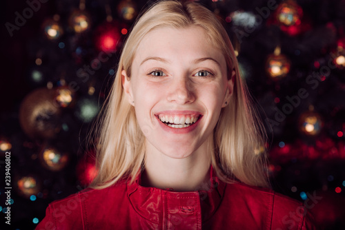 Happy new year girl. Christmas background. Merry christmas and Happy new year. Santa fun on holiday. Party face. Cheerful woman to advertise the winter sale