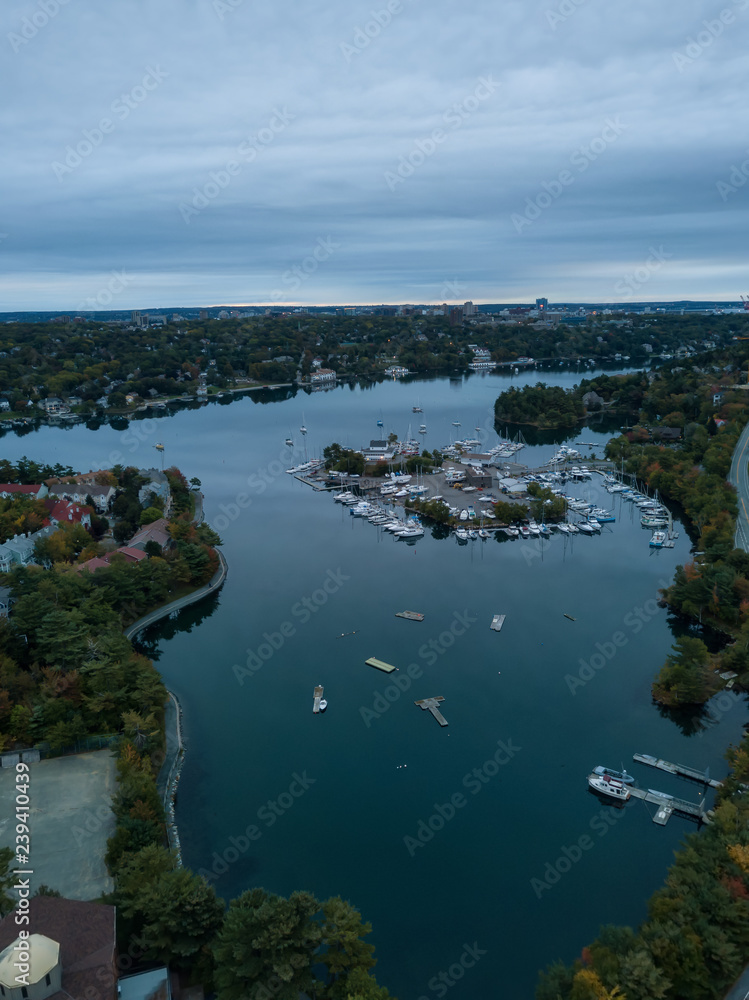 Aerial view of Melville Cove in the Modern City during a cloudy sunrise. Taken in Armdale, Halifax, Nova Scotia, Canada.