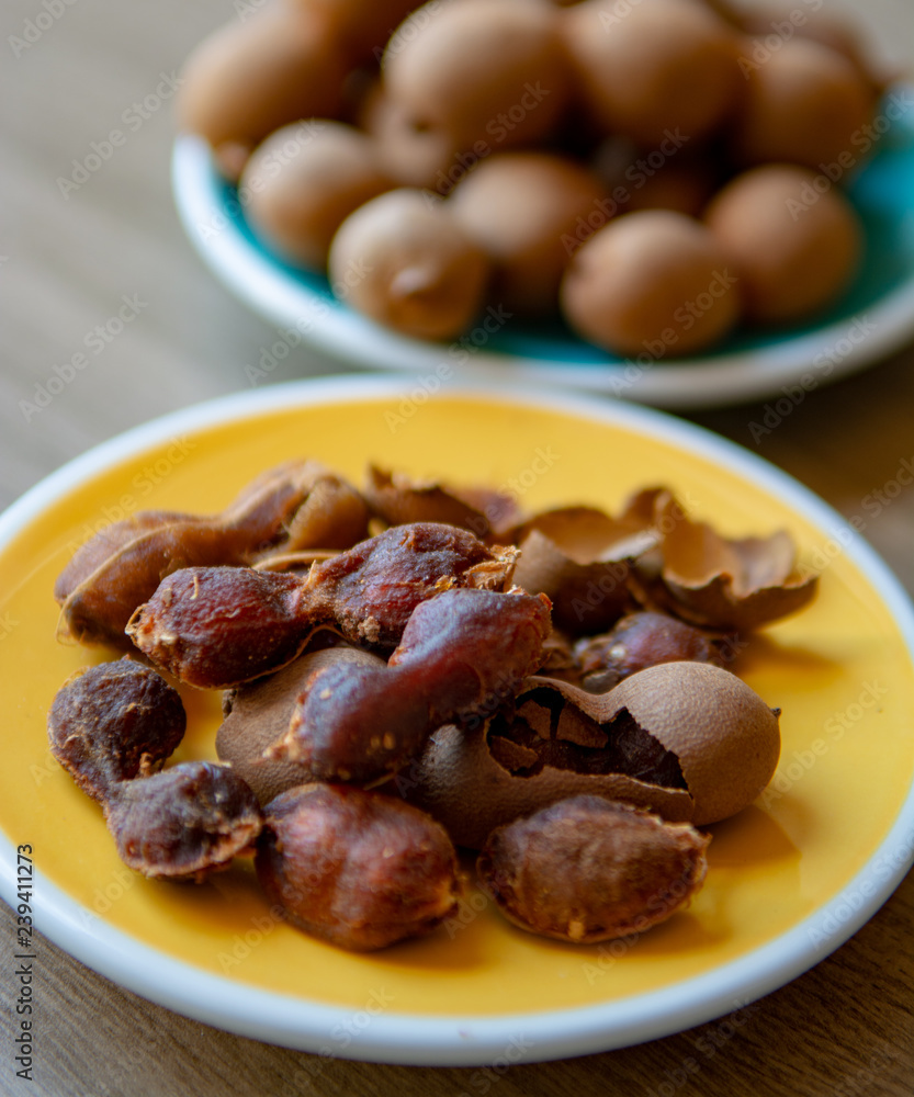Fruits of tropcal Africal tree tamarind, used in cooking, traditional medicine and metal polish Fruits of tropcal Africal tree tamarind, used in cooking, traditional medicine and metal polish