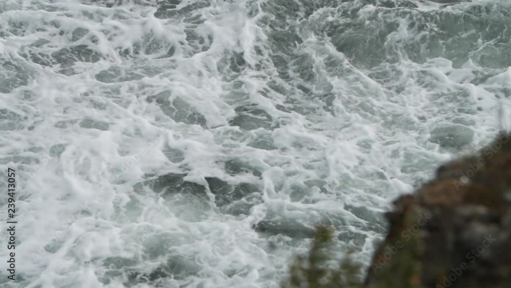 Slow motion of sea water going from slightly defocus to focus. Slow motion of sea water going from slightly defocus to focus.