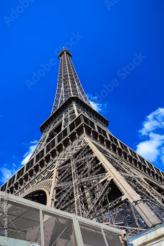The iconic Eiffel Tower on the Champ de Mars in Paris, France