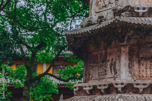 Close-up of relief sculpture on ancient pagoda in Lingyin Temple, Hangzhou, China