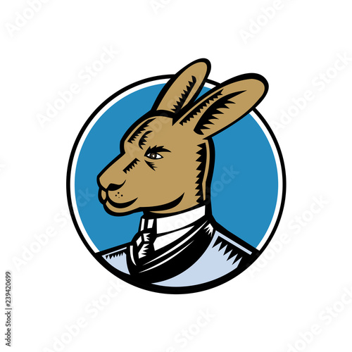 Retro woodcut style illustration of a proud wallaby, wallaroo or kangaroo wearing a Victorian gentleman style business suit looking to side of isolated white background in black and white.