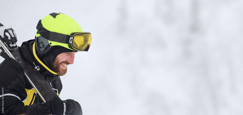 Naklejka premium Portrait of a happy male skier
