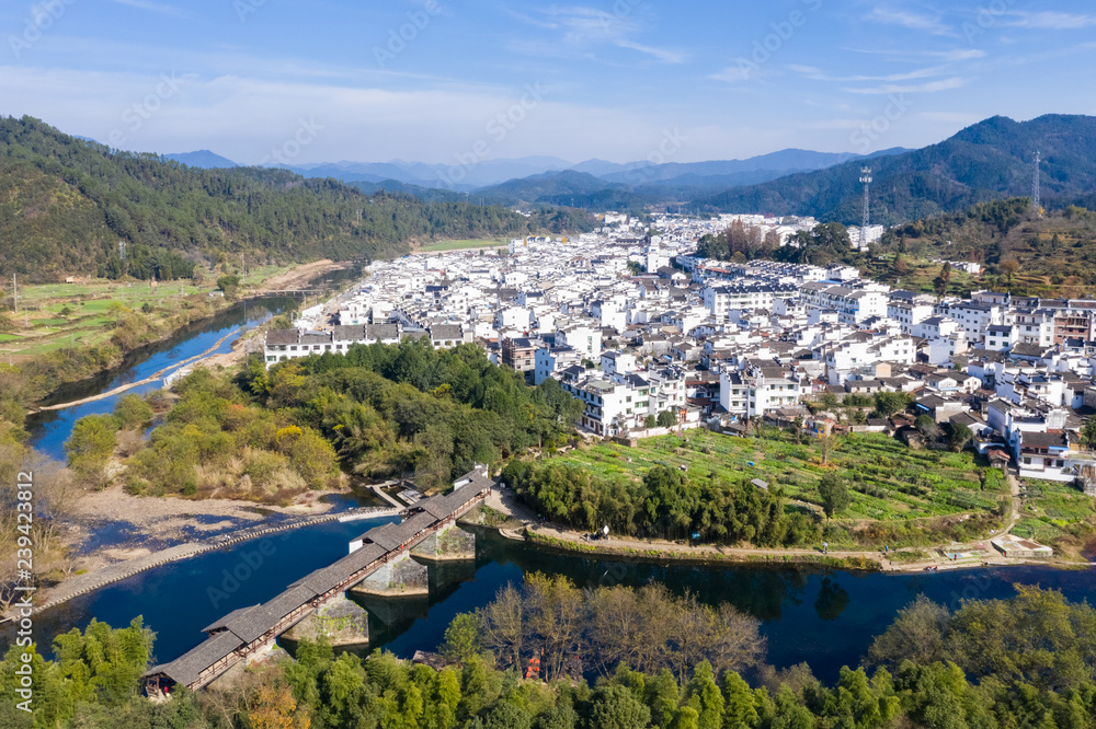 aerial view of rainbow bridge and ancient town