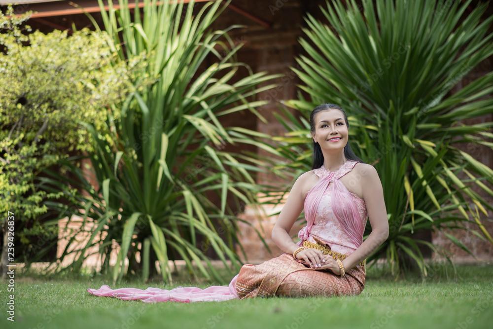 Beautiful Woman wearing typical Thai dress Beautiful Woman wearing typical Thai dress