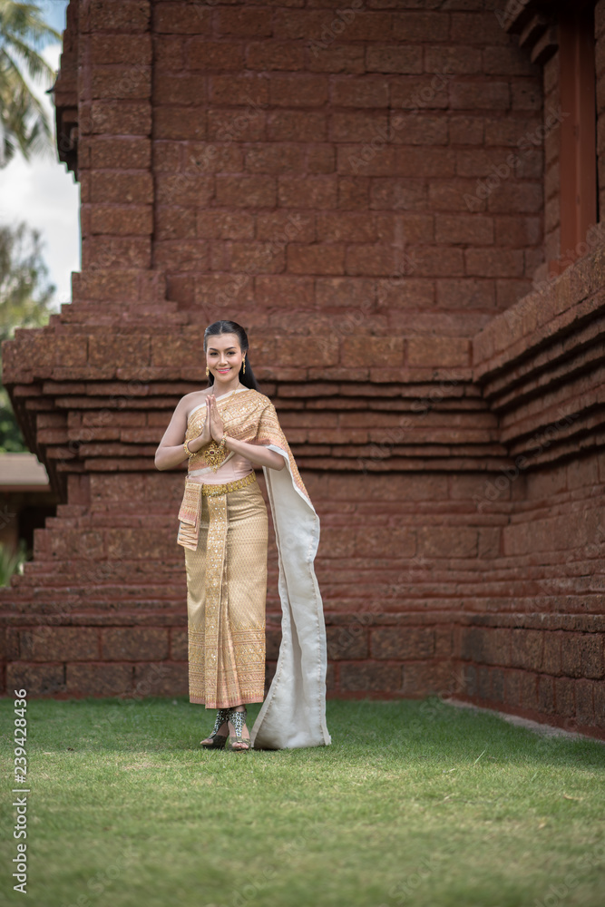 Beautiful Woman wearing typical Thai dress