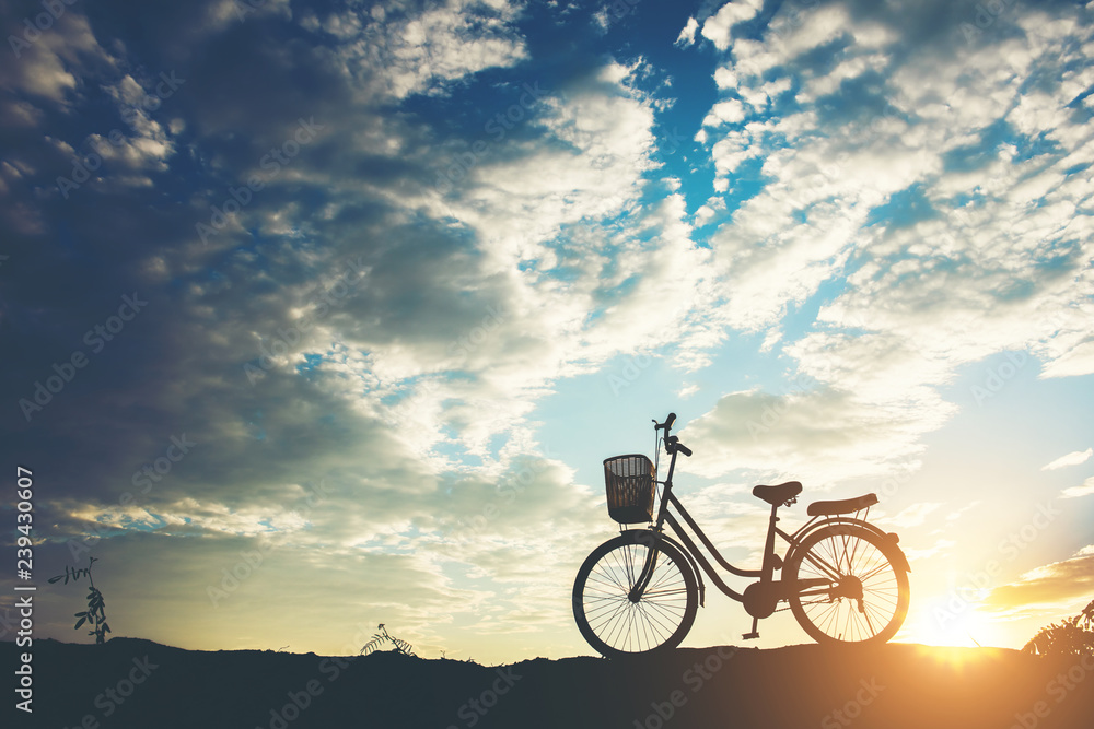 Silhouette of bicycle parking on mountain