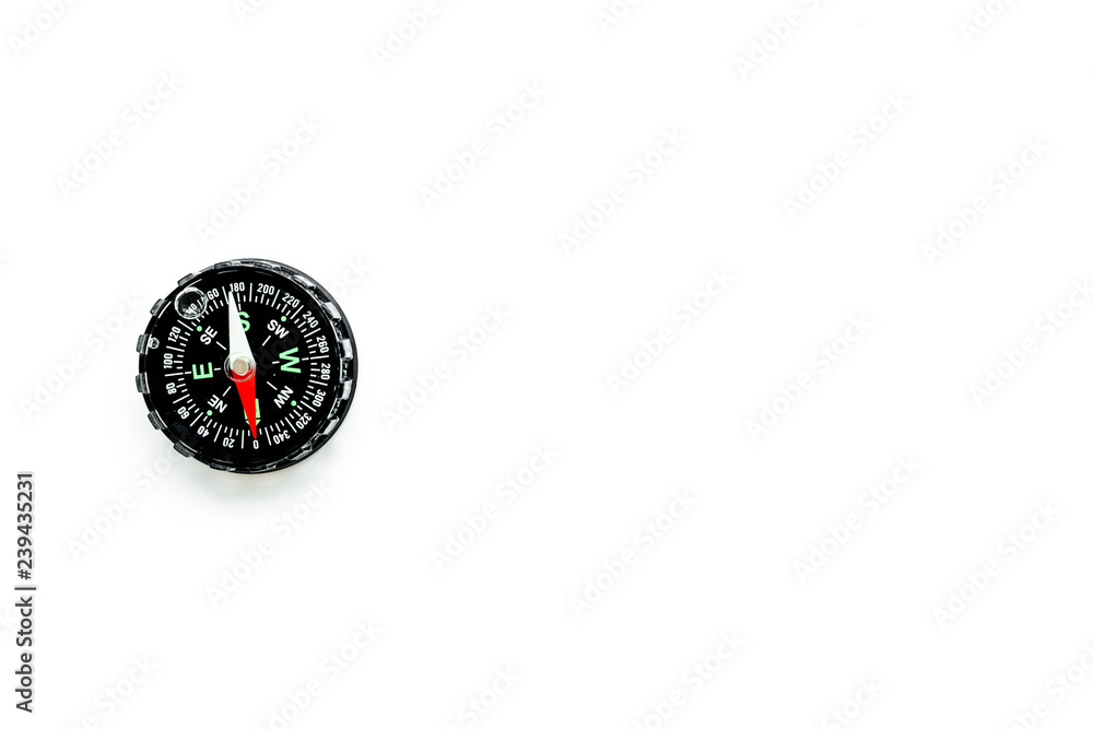 Direction of movement. Compass on white background top view copy space Direction of movement. Compass on white background top view copy space