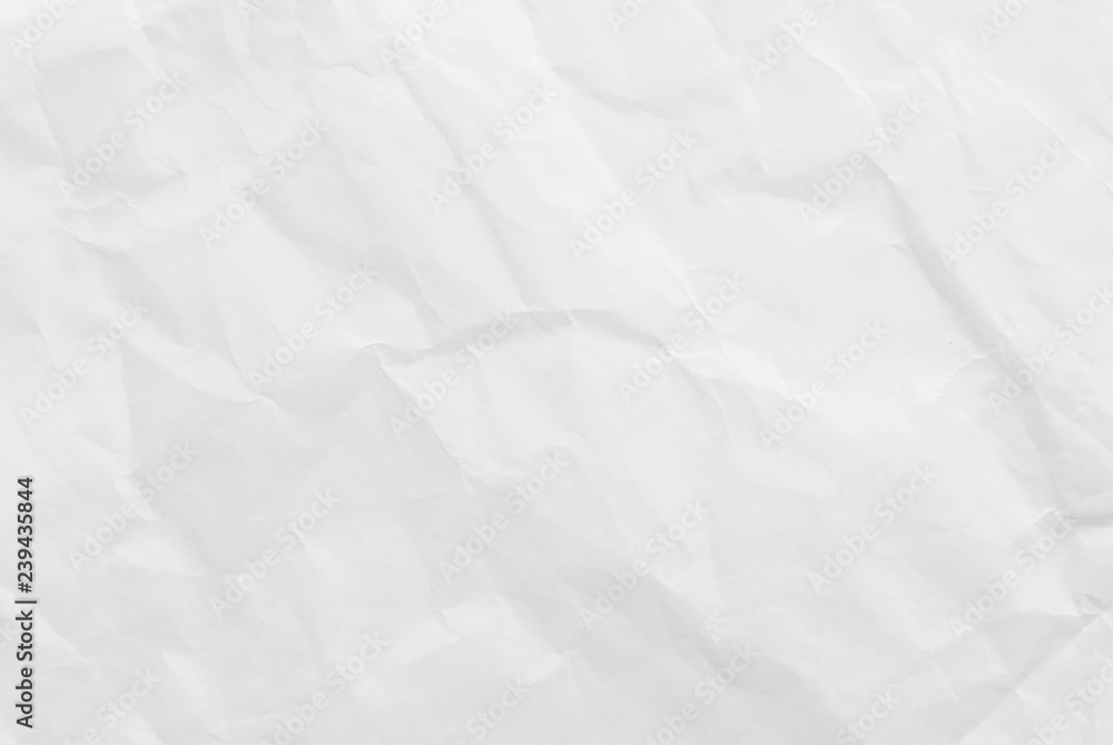White crumpled paper texture background. Close-up. White crumpled paper texture background. Close-up.
