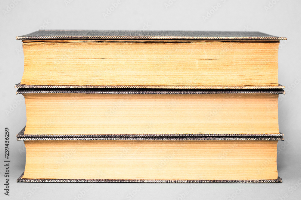 Books on a gray background. Close Books on a gray background. Close