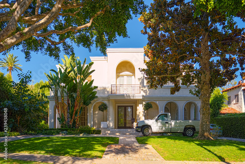 Urban views of the Beverly Hills area and residential buildings on the Hollywood hills.