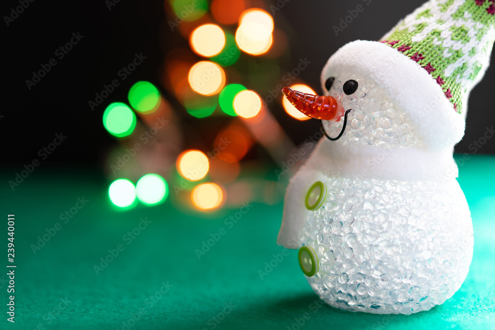 Obraz premium クリスマスイメージ イルミネーション LED 玉ボケ 雪だるま プレゼント