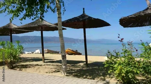 driving through pogradec looking at lake ohrid on the albanian side photo