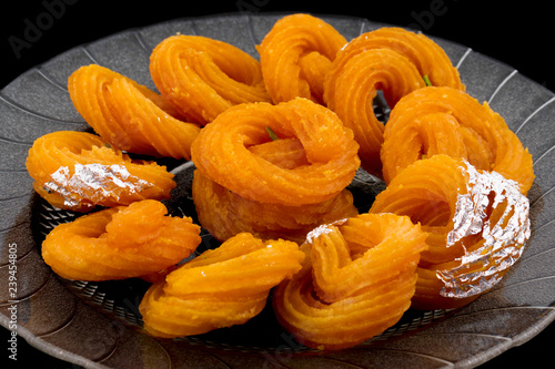 Paneer Jalebi, also Know as Chhena Jalebi, Chhena Jilapi or Zulbia is a Indian Sweet Food photo