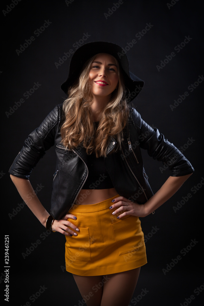 Black top top orange skirt
