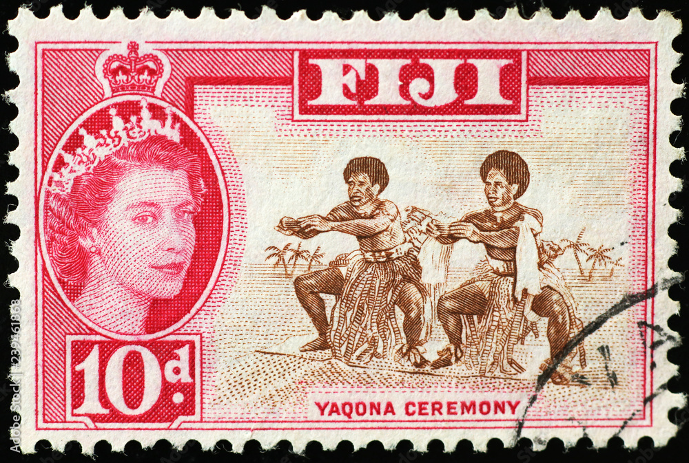 Two fijian dancers on vintage postage stamp
