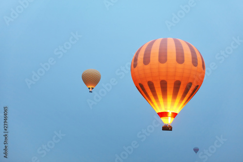 Hot Air Balloons With Fire Light Flying In Blue Sky, Travel 