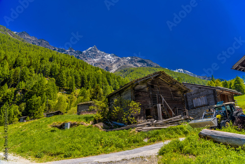 Abandoned house and tractor in Swiss Alps, Randa, Visp, Wallis,