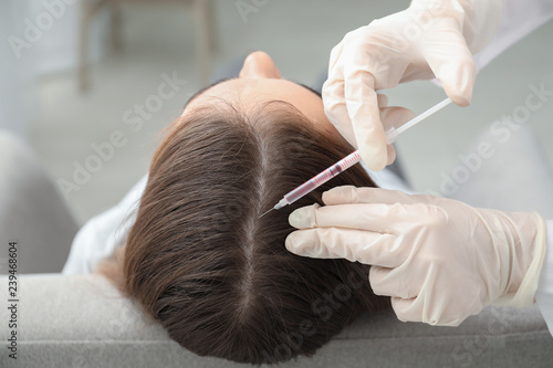 Woman with hair loss proble...
